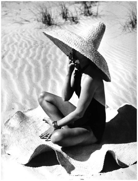 vintage bikini babe in sand with sun hat